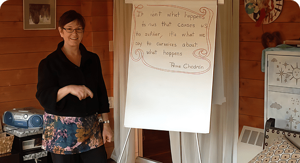 Speaker with motivational quote on board